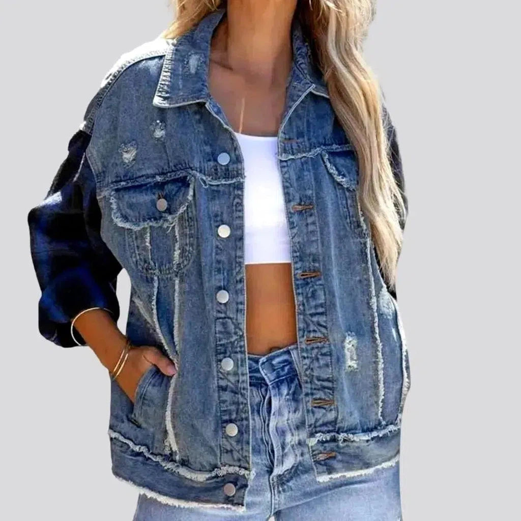 Light-wash distressed jean jacket for ladies