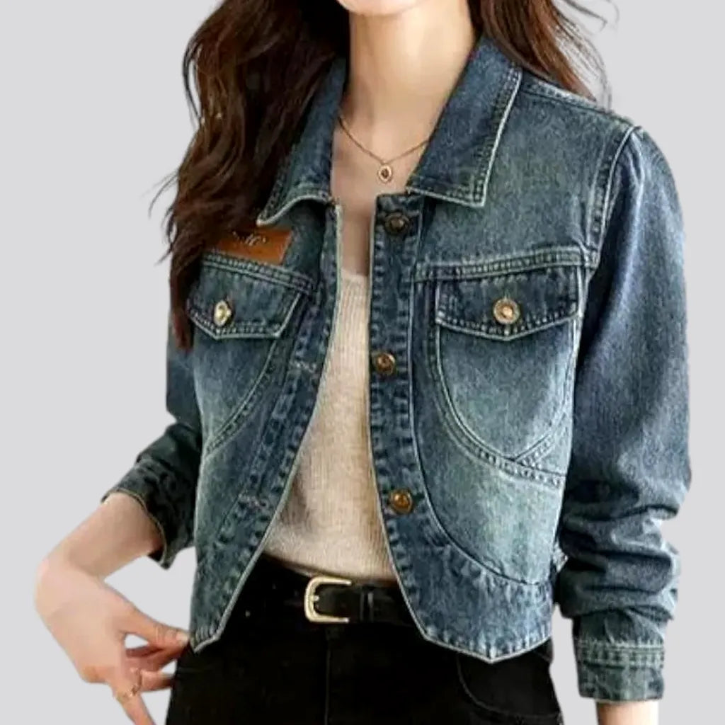 Asymmetric sanded jean jacket for women